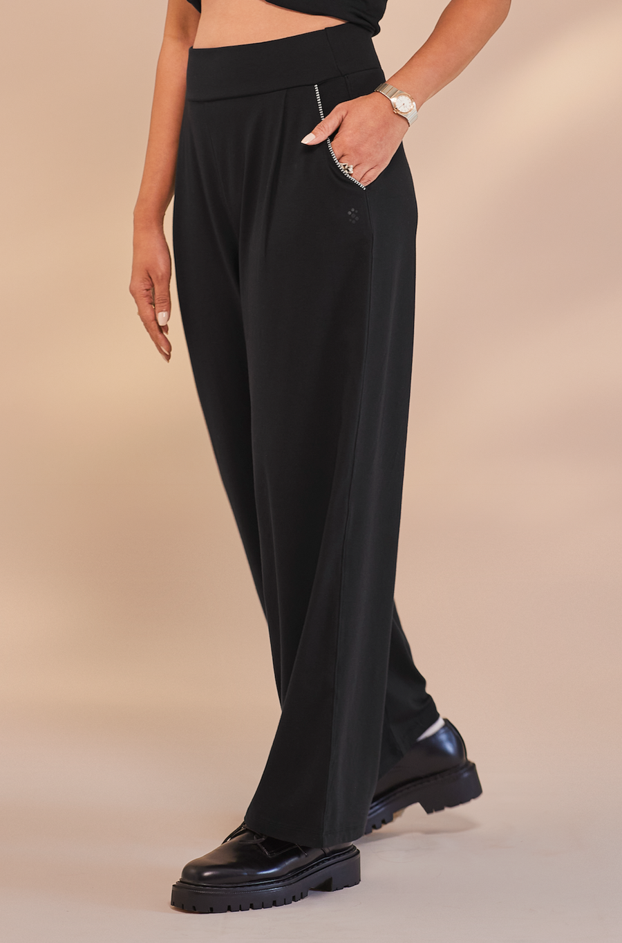 black pleated pants