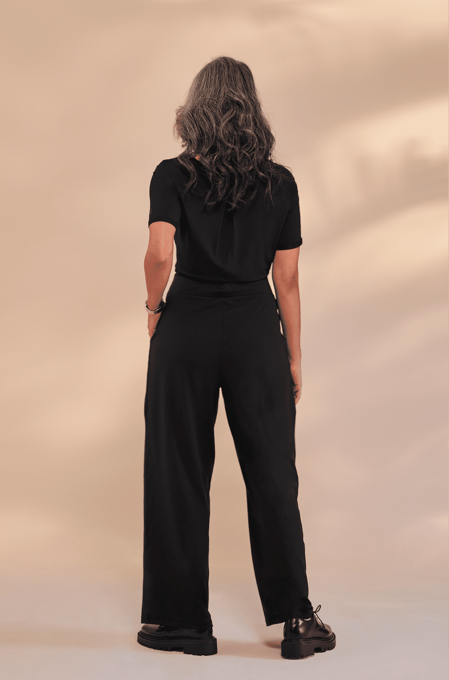 black pleated pants